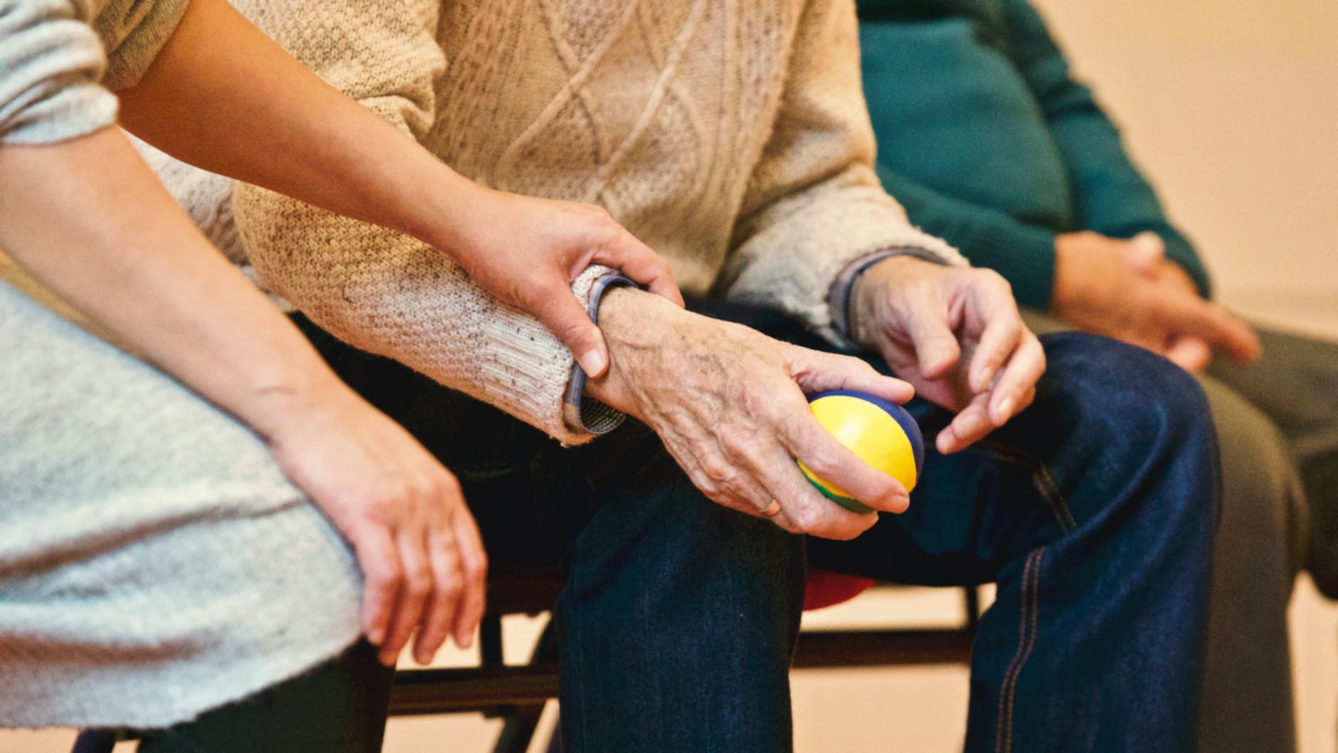 aged care on the menu in Australia person holding a stress ball
