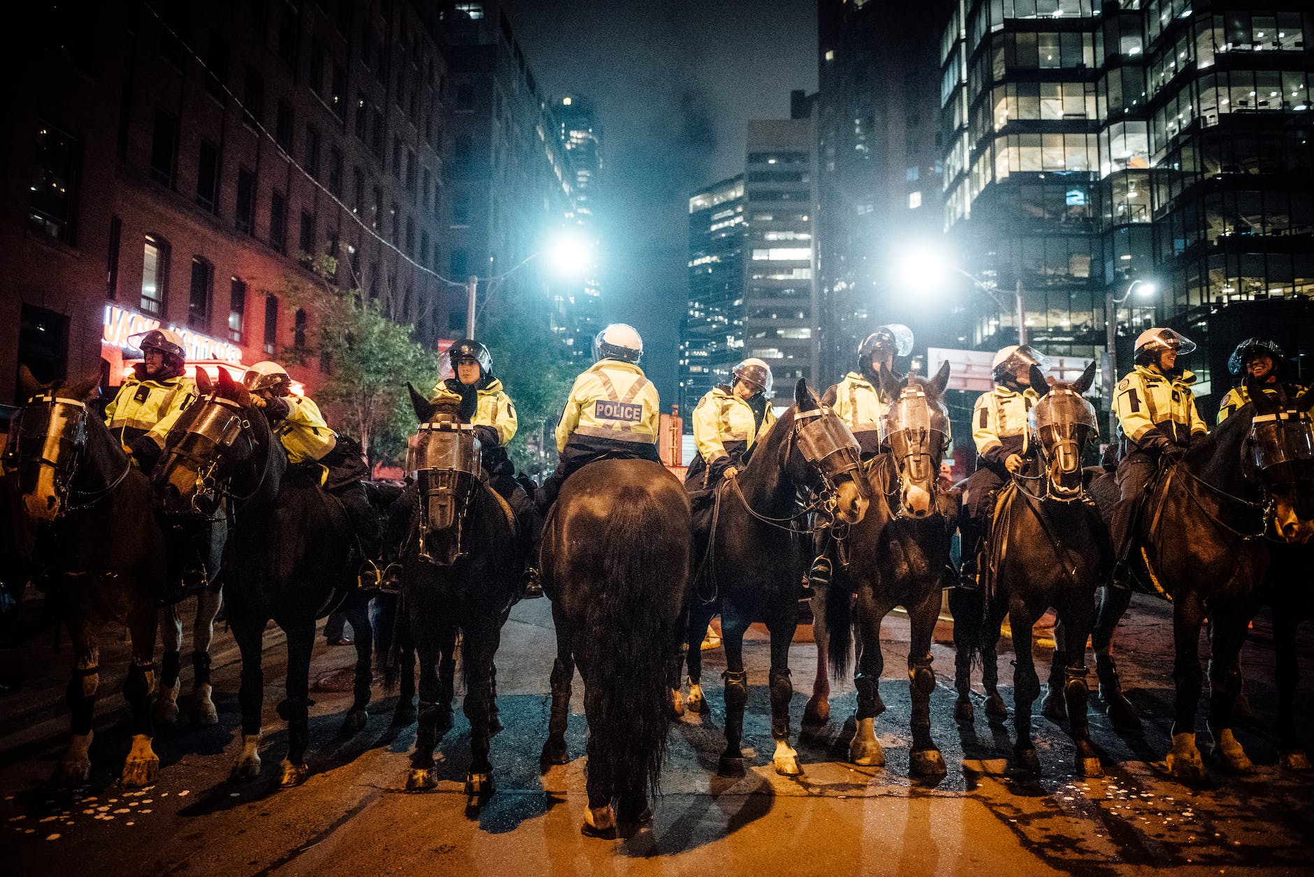 fascism is on the rise group of policemen on horse