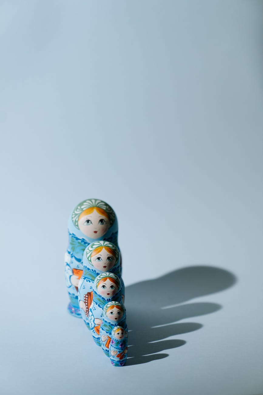 Russian Oligarchs Leaping To Their Deaths blue and white ceramic figurine