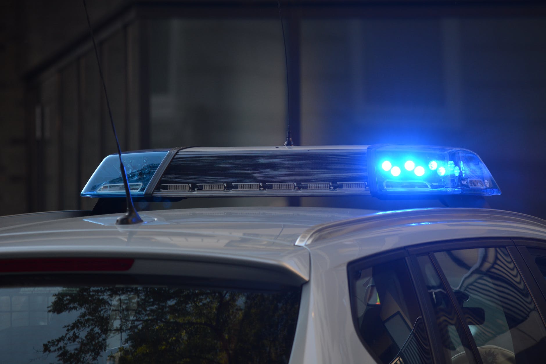 police shootings in Queensland -auto automobile blur buildings
