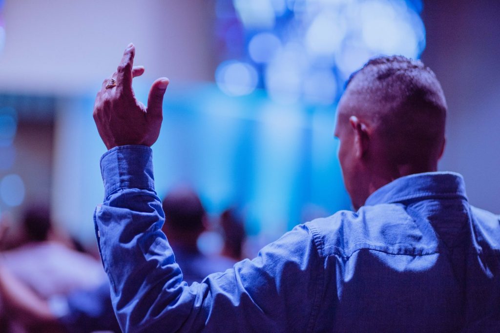 Religion: What is it good for? man wearing blue dress