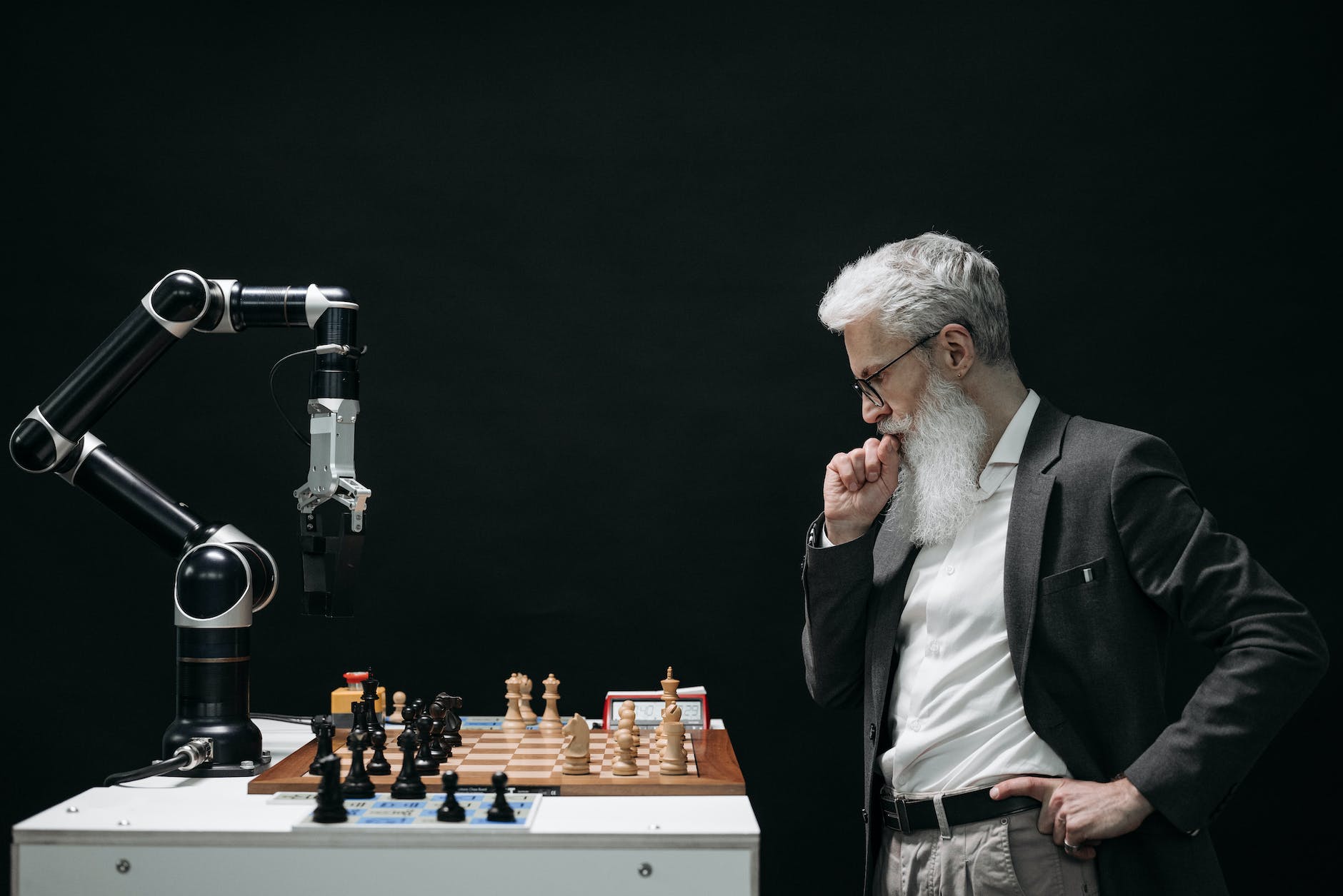 elderly man thinking while looking at a chessboard - I asked AI about the evidence for the existence of God