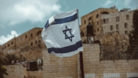 blue and white flag on pole