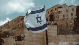 blue and white flag on pole